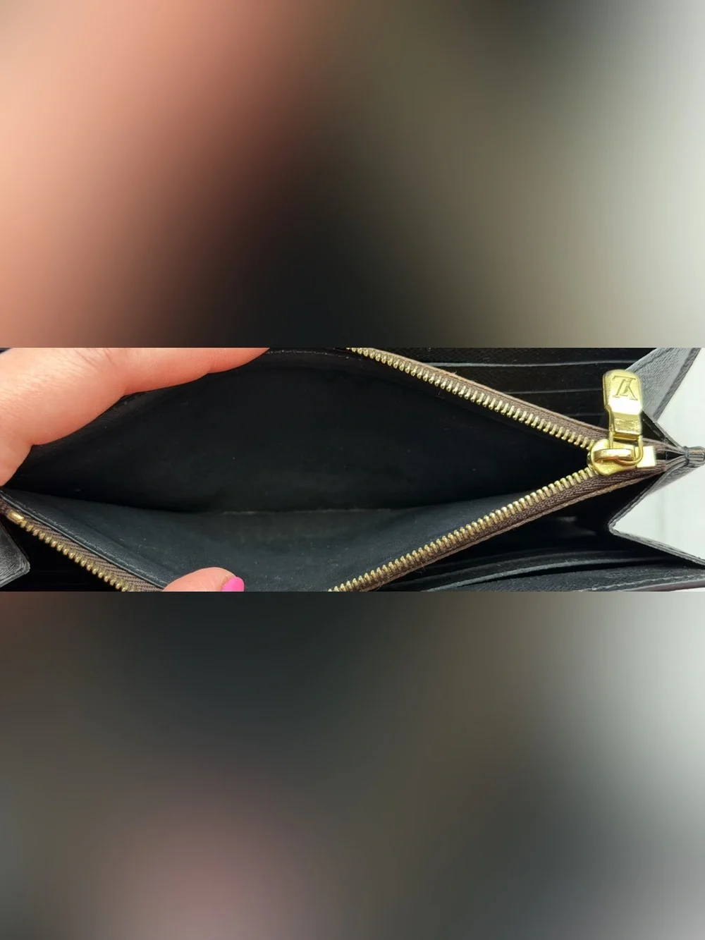 Louis Vuitton Sarah wallet in reverse monogram